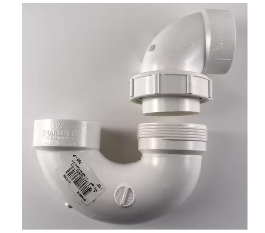 Charlotte Pipe 1-1/2 in. DWV PVC P-Trap with Union and Plastic Nut